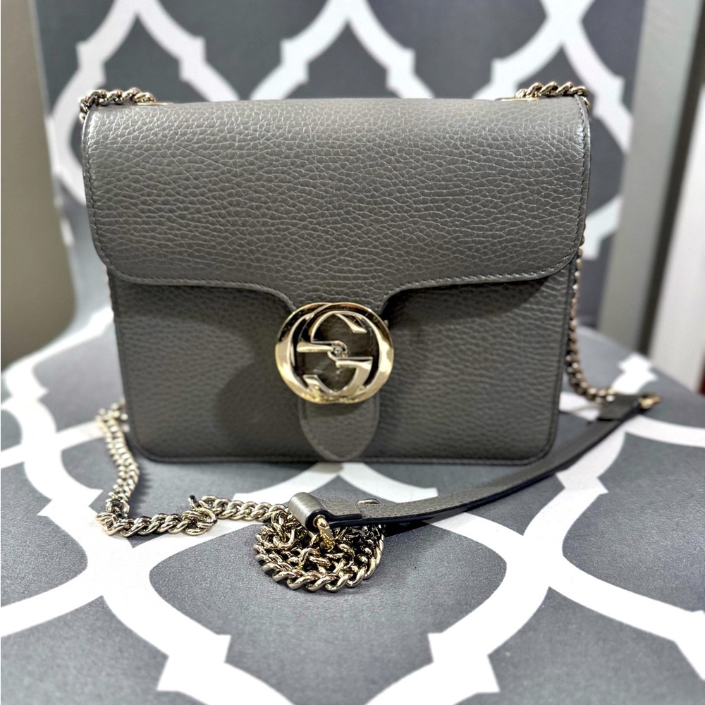 Authentic Gucci interlocking G crossbody shoulder bag gray with silver hardware.